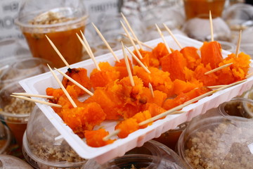 Roasted pumpkin with honey and walnuts. Sweet grilled squash. Food wallpaper. Pumpkun cover photo. Photo for menu