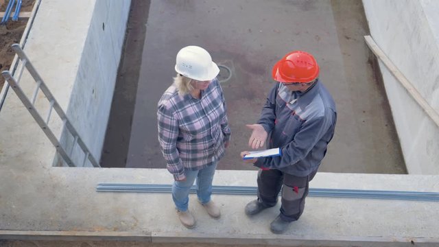 Top View Of The Construction Site Where Customer And Builder To Discuss The Plan