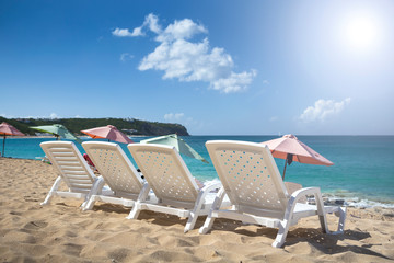 White chairs at the beach on Sint Maarten
