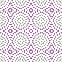 Seamless abstract pattern background with a variety of colored circles.