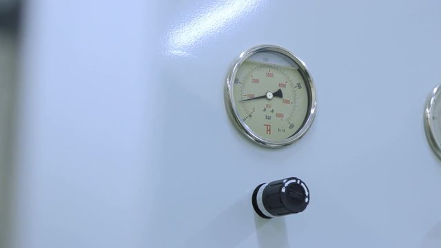 Pressure gauge measuring. Closeup of manometer filled with glycerin