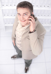 view from the top.successful young businessman looking at the c