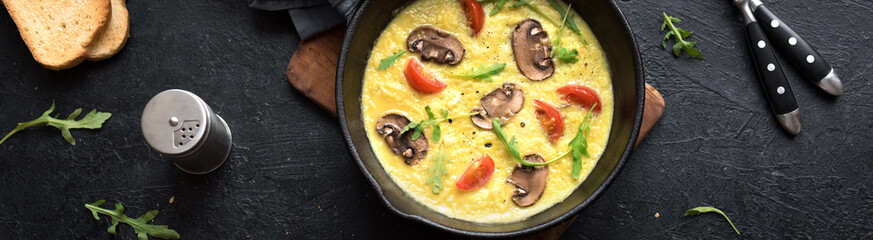 Omelette with mushrooms and vegetables