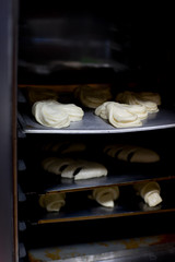 different kinds of pastry are being cooked