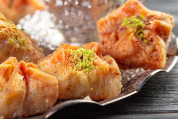 Homemade baklava with nuts and honey syrup