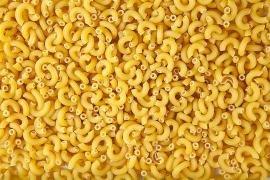 Nature agriculture maccheroni. Concept of pasta packaging. Texture of maccheroni for packing and 3D. Macro texture. Background image.