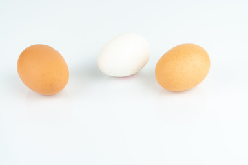 Three eggs on white background