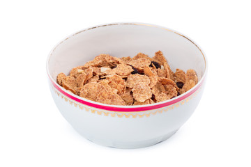 Corn flakes in a bowl isolated on white background