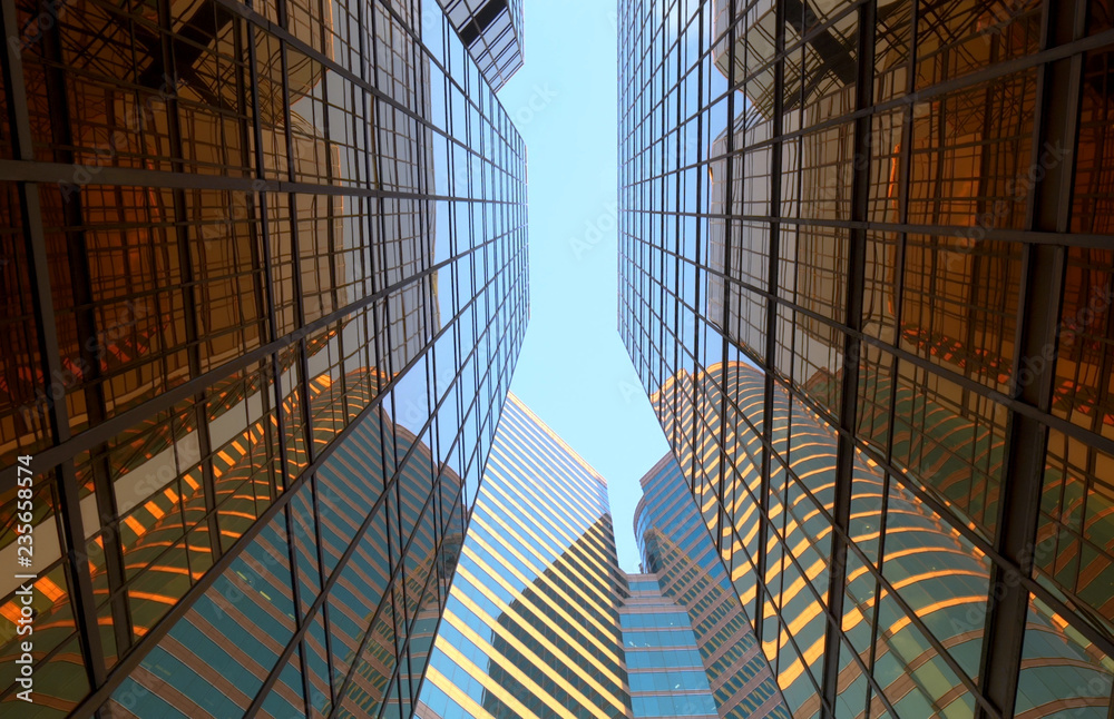 Wall mural business company office buildings. low angle view of concrete and glass skyscrapers. futuristic mode