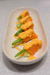 Salmon Roll With Asparagus And Fresh Cucumbers Garnished With Sh