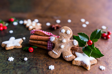 Homemade Christmas gingerbread cookies on vintage background.
