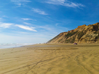 Pickup truck on a sandy beach
