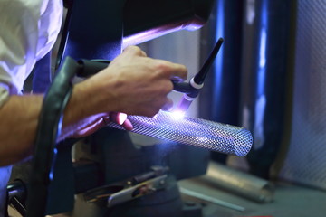 welder working in workshop
