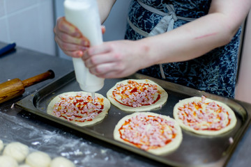 different kinds of pastry are being cooked