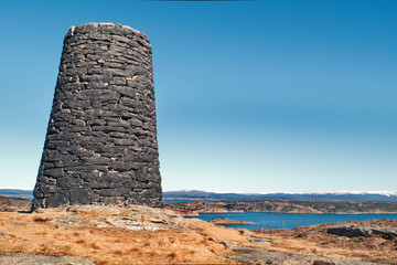 The old stone watch tower on the west coast of Norway