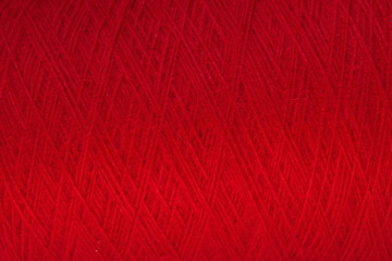 Alpaca wool yarn red color background