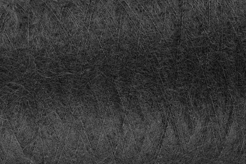 Kid mohair  wool yarn black color background