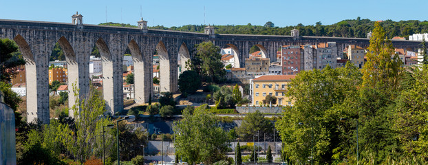 Fototapeta na wymiar The Aqueduct Aguas Livres in Portuguese: Aqueduto das Aguas Livres Aqueduct of the Free Waters is a historic aqueduct in the city of Lisbon, Portugal