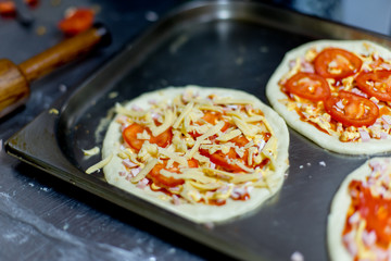 different kinds of pastry are being cooked