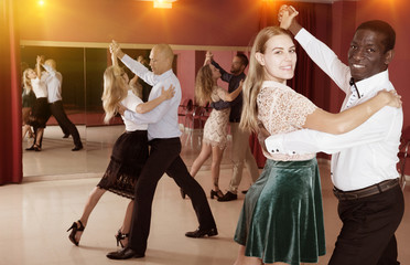 People learning to dance waltz