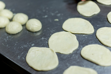different kinds of pastry are being cooked