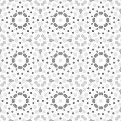Seamless abstract pattern background with a variety of colored circles.