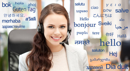 translation, communication and technology concept - smiling female helpline operator with headset...