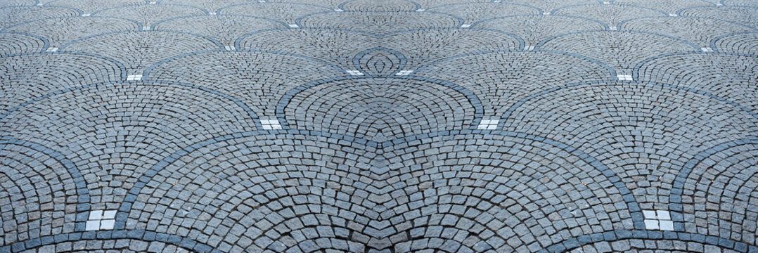 Granit Kopfsteinpflaster mit Bogenmuster