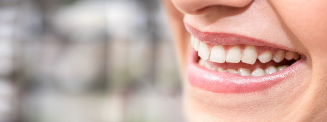Beautiful smile of young woman