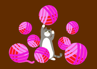 ピンク色の毛糸玉で遊ぶ猫ちゃん