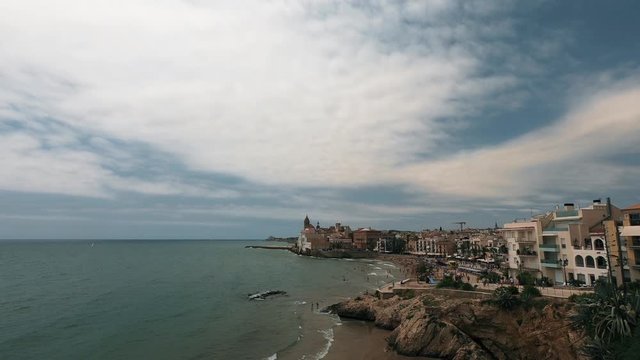 View of the coastline and the sea in Sitges, Spain.