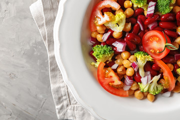 Tasty salad with chickpeas on plate, closeup
