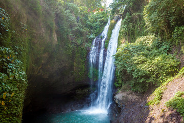 Famous Aling-Aling waterfall without people among green tropical jungle on the north of Bali island, Indonesia