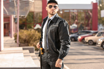 Male security guard outdoors