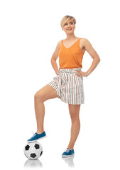 sport, leisure and people concept - smiling teenage girl with soccer ball over white background