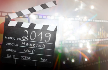 Naklejka premium New year 2019 abstract film and destiny concept on blured background with clapperboard