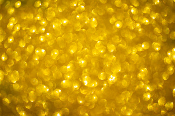 Golden bokeh background with copy space for poster at christmas