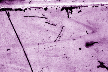Grungy rusted metal surface in purple tone.