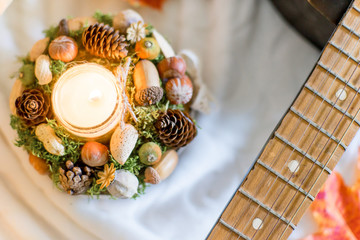 Autumn composition with dry leaves and ripe pumpkins