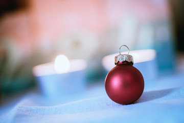 Red Christmas balls with decoration on shiny background