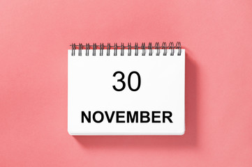 Calendar book date pink background 30 november