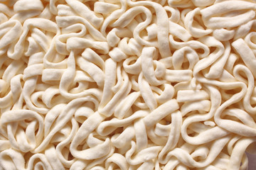 close up on uncooked raw noodles