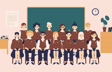 Class group portrait. Smiling girls and boys dressed in school uniform or pupils sitting in classroom against chalkboard on background and posing for photography. Flat cartoon vector illustration.