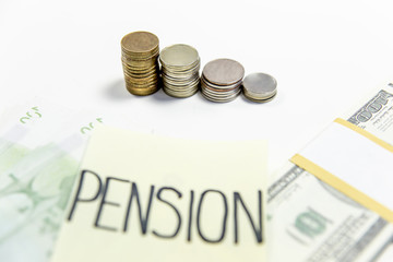 retirement fund concept - money and a calculator