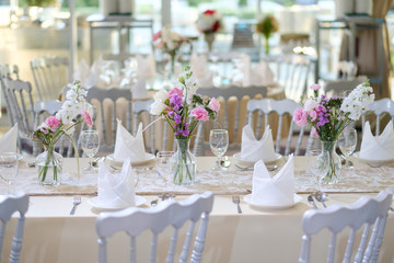 The wedding decor. The white flowers bouquet.