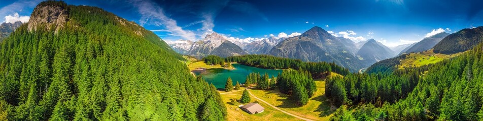 Areal view of Arnisee with Swiss Alps. Arnisee is a reservoir in the Canton of Uri, Switzerland, Europe - obrazy, fototapety, plakaty