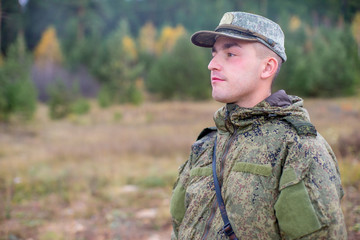 a portrait of a brave soldier standing