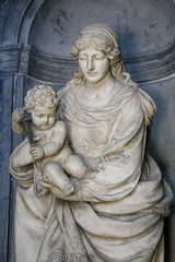 Fototapeta na wymiar Sculpture of Madonna and Child at Amiens Cathedral, France