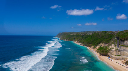 Fototapeta na wymiar Beach on aerial drone top view with ocean waves 