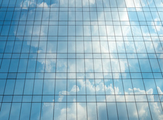 Fototapeta premium Reflection of Sky and cloud on glass building